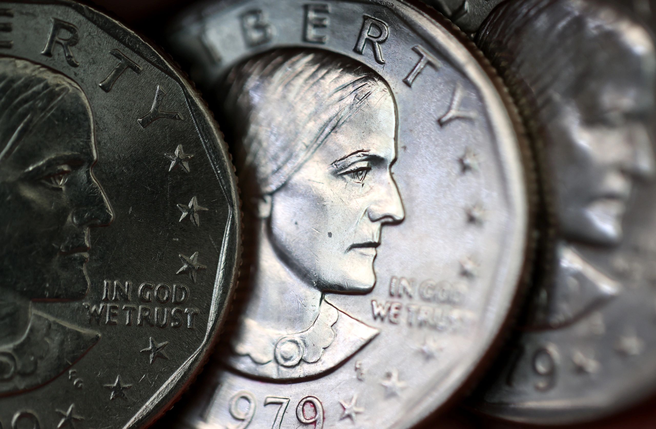 Close-up of silver coins representing secure asset tracking.